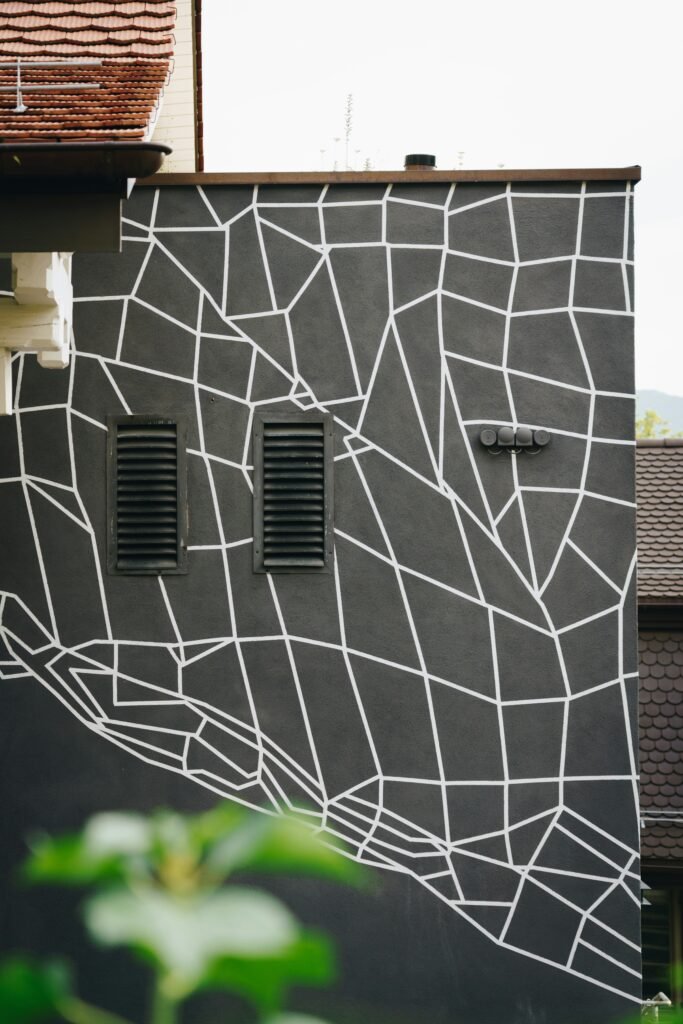 white and black tribal wall at the building  Wall Art Ideas for a Modern Home