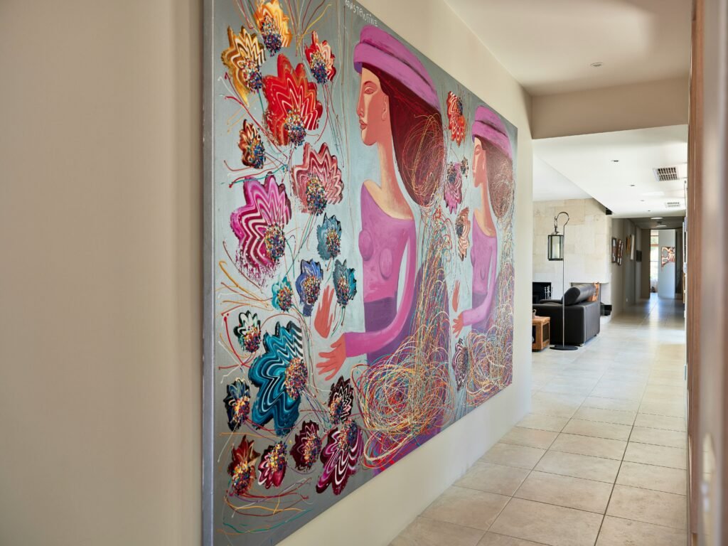 a  hallway with a large painting on the wall  Art Ideas for a Modern Home
